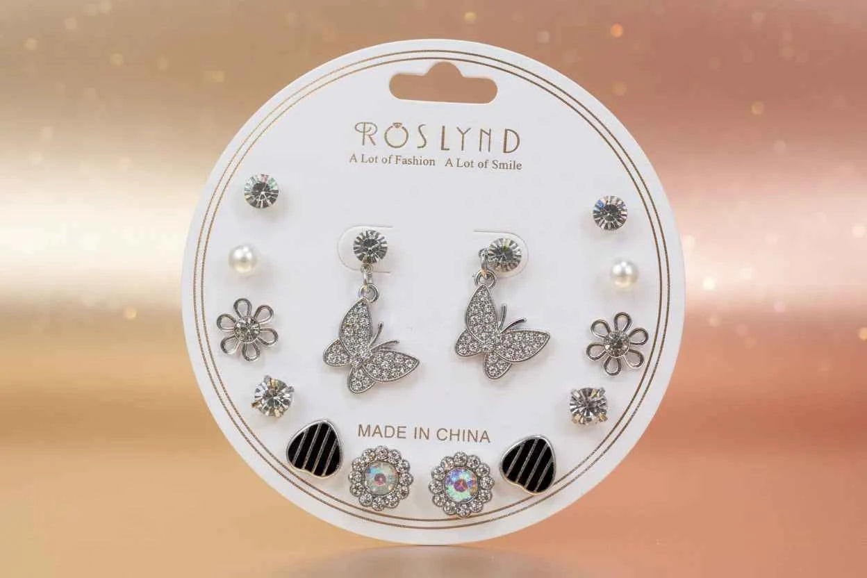 Flutter into Style: 8-Pair Silver Butterfly, Flower & Sparkle Earring Set